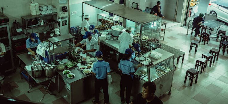 High Angle Shot of Chefs Preparing Meals in a Canteen