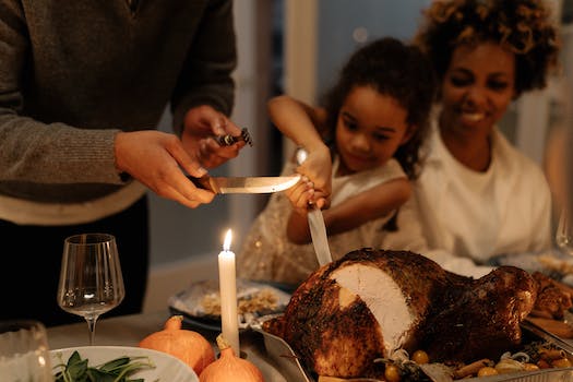 Little Girl Slicing the Turkey