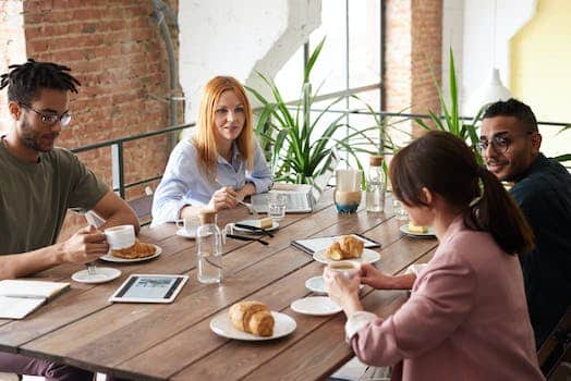 Group of People Sitting Indoors