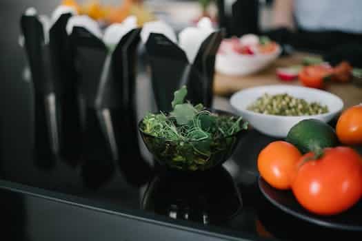 Green Vegetable on Black Ceramic Bowl