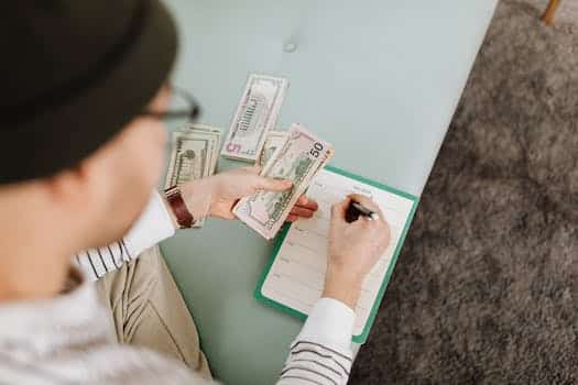 Person Planning Budget Counting Money