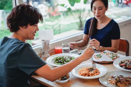 Asian women having lunch in restaurant