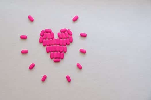 Pink Medicines In Heart Shape